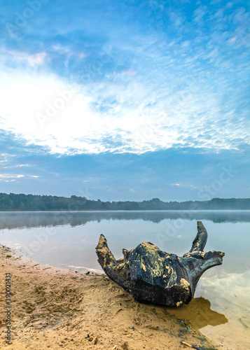 Amazing shot of a mountain landscape near the Niedringhaussee lake in Westerkappeln, Germany photo