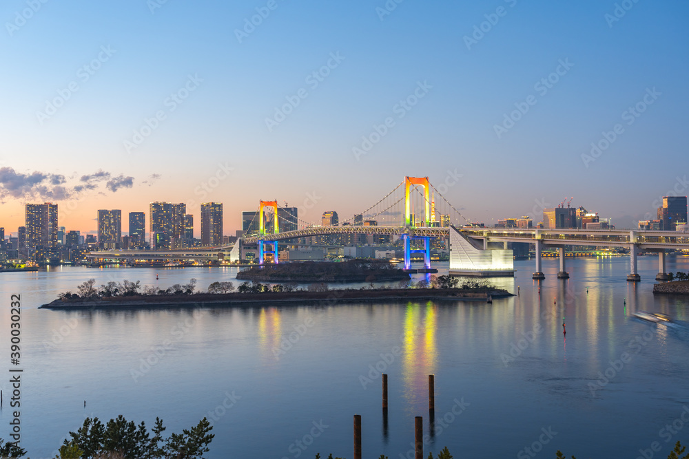 Tokyo bay at night with view of Rainbow Bridge in Tokyo city, Japan