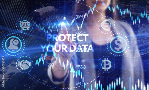 Business, Technology, Internet and network concept. Young businessman working on a virtual screen of the future and sees the inscription: Protect your data
