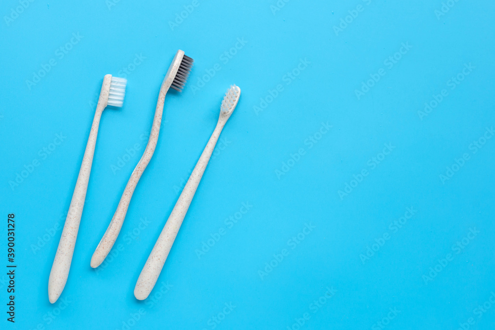 Toothbrushes on blue background. Top view Toothbrushes on blue background. Top view