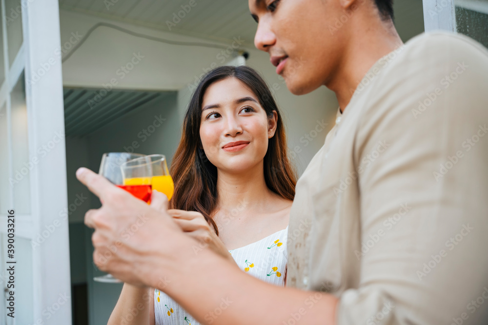 Couple celebrate anniversary party with wine glass at home. Couple celebrate anniversary party with wine glass at home.