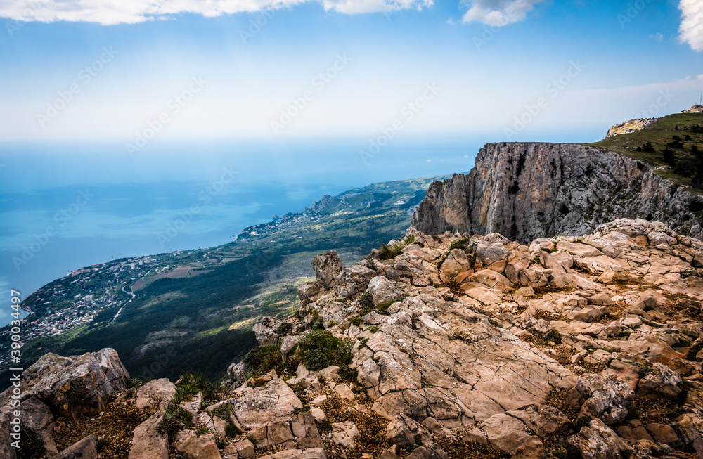 Φωτογραφία Stones on top of the Crimean mountains on the background of the valley on the Black sea in the fog