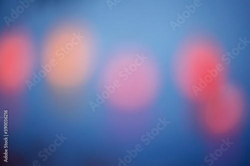 Blurred colorful bokeh lights in the night