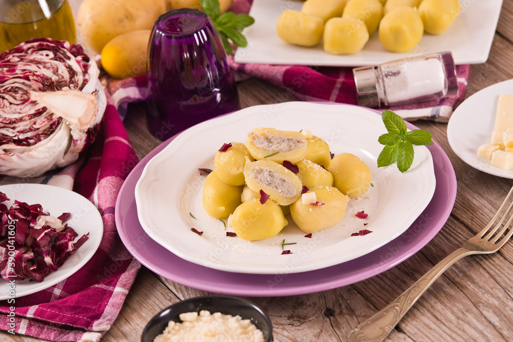 Potato gnocchi stuffed with radicchio and ricotta. Potato gnocchi stuffed with radicchio and ricotta.