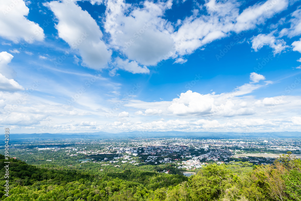 view in the mountains with cityscape over the city airatmosphere bright blue sky background abstract clear texture with white clouds. of Chiang Mai,Thailand