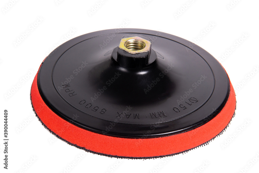 Plastic with velcro Tape Strips for Circular sandpaper discs. It is used together with grinding machine isolated on white background. Plastic with velcro Tape Strips for Circular sandpaper discs. It is used together with grinding machine isolated on white background.