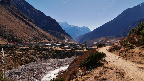 Beautiful view of small sherpa village Hilajung located in a valley near Thame, Khumbu Region, Sagarmatha National Park, Himalayas, Nepal on Three Passes Trek. Sunny day with no clouds.