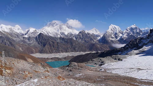 Spectacular mountain panorama with some of the highest mountains on earth (Mount Everest 8,848 m, Lhotse 8,516 m, Makalu 8,481 m) viewed from popular Renjo La pass in the Himalayas, Nepal. photo