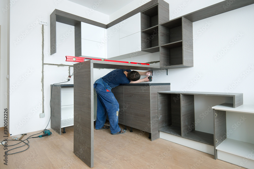 Installing kitchen furniture in a new small apartment Installing kitchen furniture in a new small apartment
