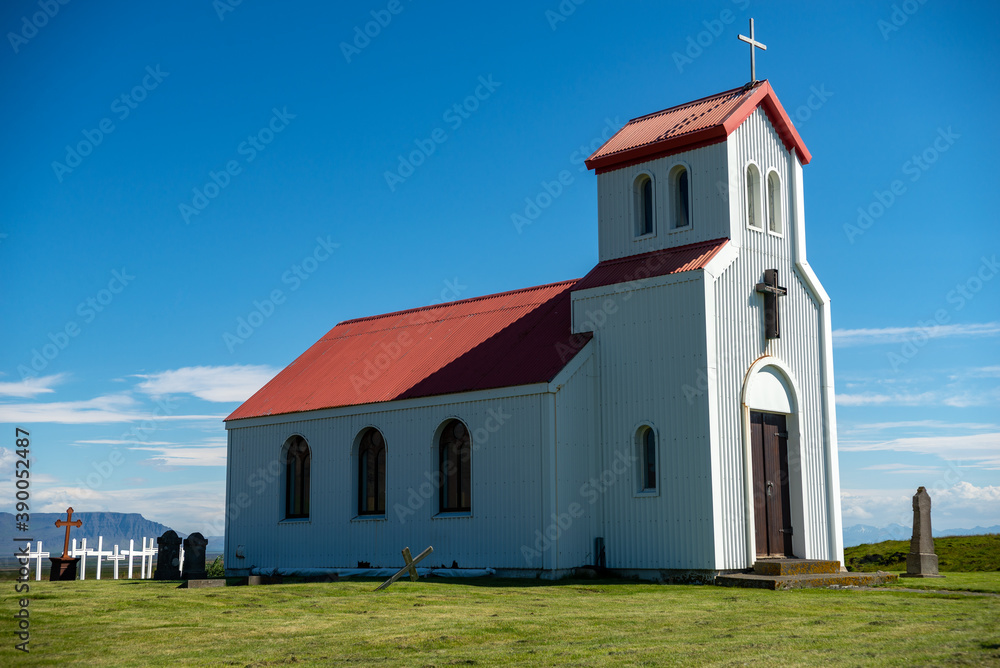 Typical Rural Icelandic Church under a blue summer sky
