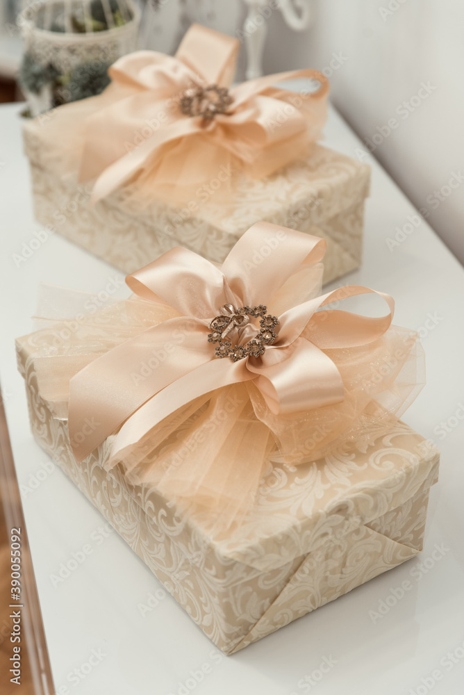 gift box bow with brooch isolated gift box bow with brooch isolated