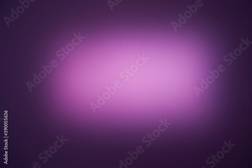 Light purple oval cloud of light on purple background