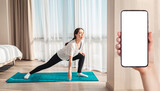 Yoga in the bedroom. A young pretty woman trains at home on a sports mat. A females hand holds a smartphone. Mock up. Side view. The concept of home workouts