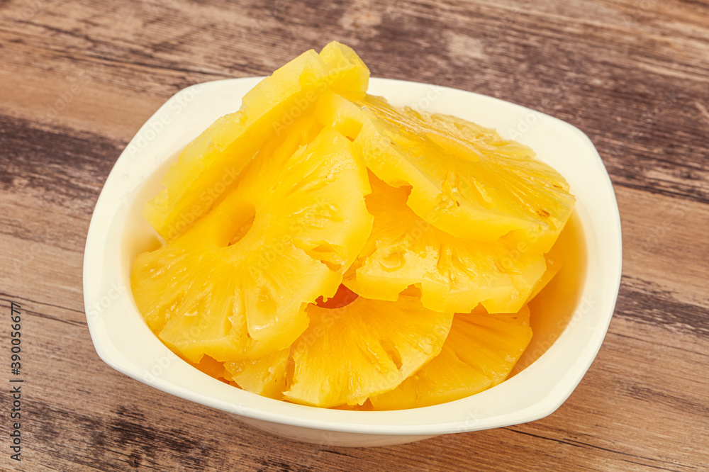 Marinated pineapple rings in the bowl Marinated pineapple rings in the bowl