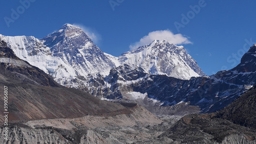 Beautiful panorama view of majestic Mount Everest (also Sagarmatha, summit 8,848 m) including South Col and Hillary Step with rock-covered Ngozumpa glacier viewed from upper Gokyo valley, Nepal. © Timon