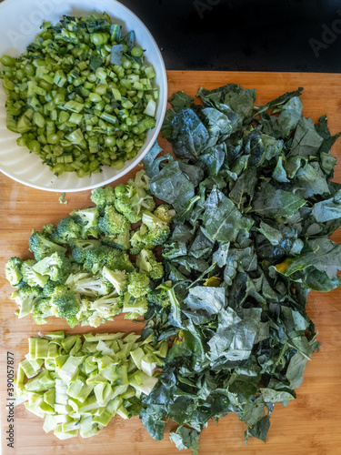 Fototapeta Naklejka Na Ścianę i Meble -  Whole broccoli with leaves and stem broken down zero waste vegan healthy veggies 