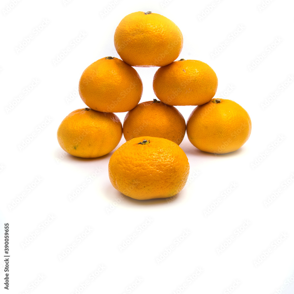 Tangerines on a white background, isolated, copy space, top view, close-up Tangerines on a white background, isolated, copy space, top view, close-up