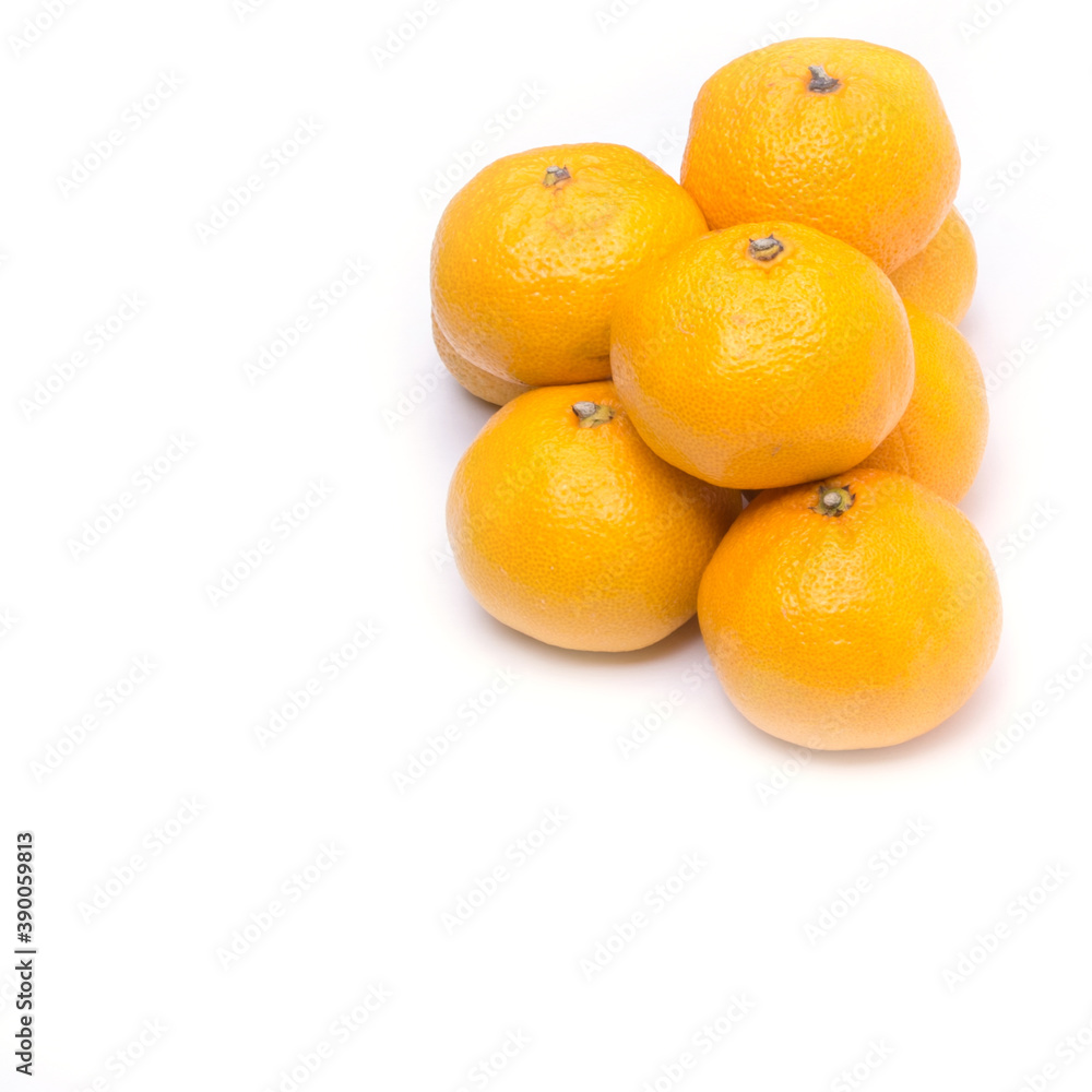 Tangerines on a white background, isolated, copy space, top view, close-up Tangerines on a white background, isolated, copy space, top view, close-up