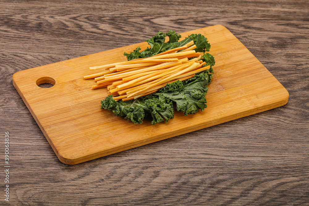 Chechel cheese sticks over board