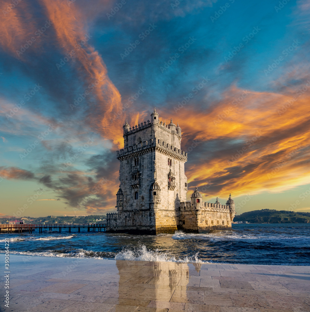 Belem tower under the sky at sunset