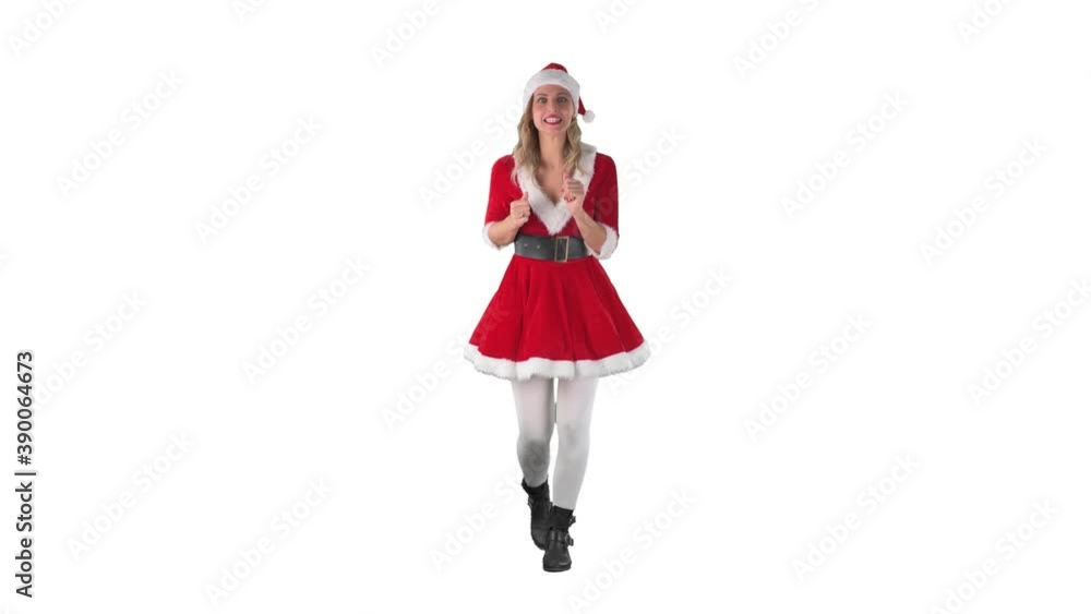 Sneaky funny Santa helper girl in Christmas costume sneaking and walking on tiptoe. Full length isolated on white background. Sneaky funny Santa helper girl in Christmas costume sneaking and walking on tiptoe. Full length isolated on white background.