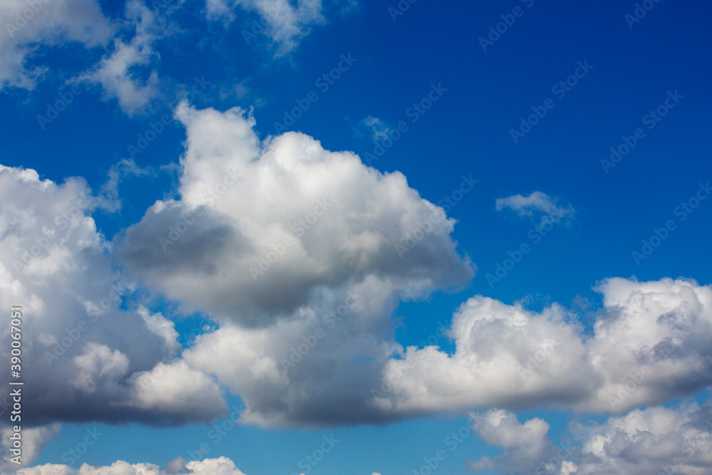 White clouds cumulus floating on blue sky for backgrounds concept White clouds cumulus floating on blue sky for backgrounds concept