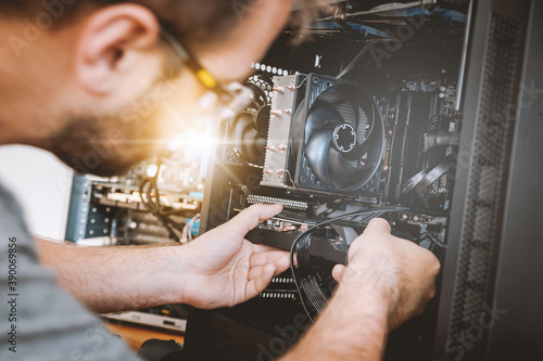 Fotografie Technician fixing computer hardware