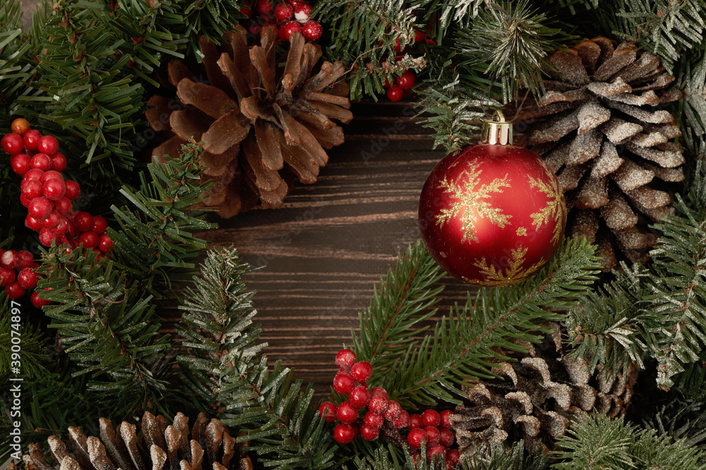 Christmas decoration baubles with branches of fir tree on wooden background Christmas decoration baubles with branches of fir tree on wooden background