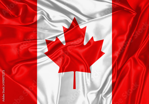 Canada flag waving in the wind. National flag on satin cloth surface texture. Background for international concept.