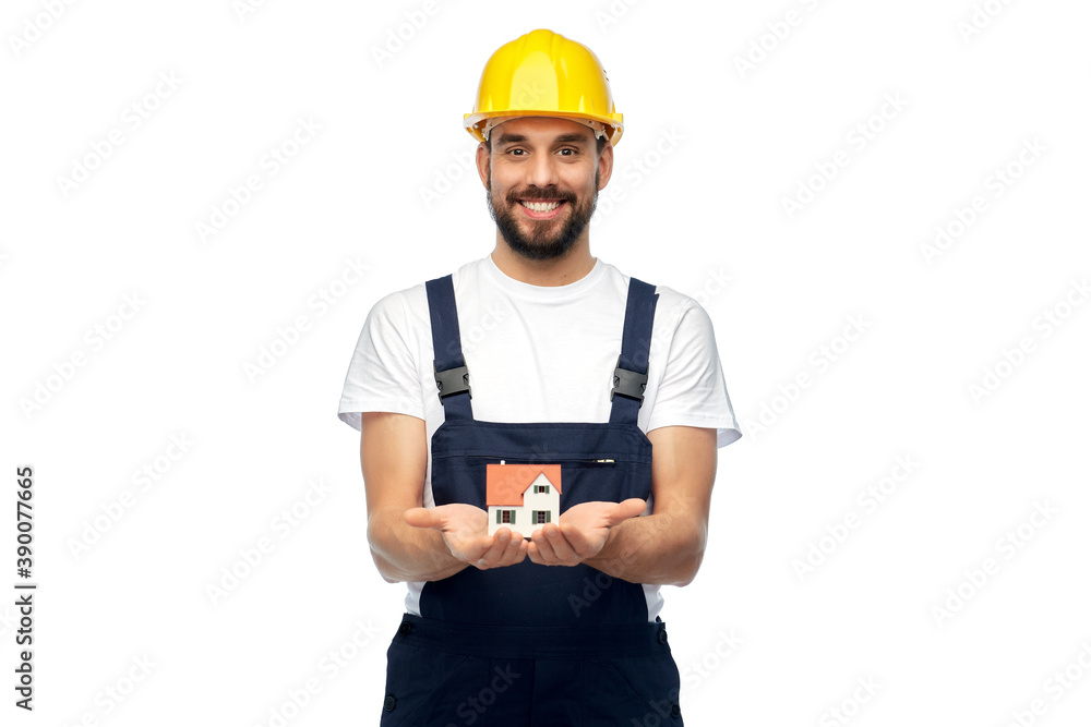 profession, construction and building - happy smiling male worker or builder in yellow helmet and overall holding model of living house over white background profession, construction and building - happy smiling male worker or builder in yellow helmet and overall holding model of living house over white background