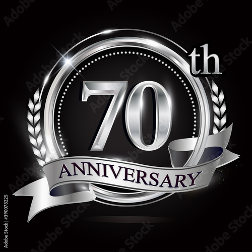 Celebrating 70th anniversary logo, with silver ring and ribbon.