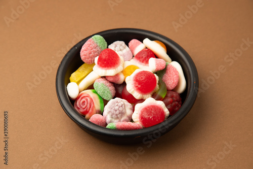 candy  sugar on black bowl