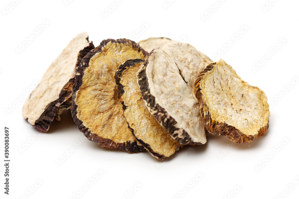 Peruvian ginseng or maca Lepidium meyenii, dried root and pow ,slice on a white background Peruvian ginseng or maca Lepidium meyenii, dried root and pow ,slice on a white background