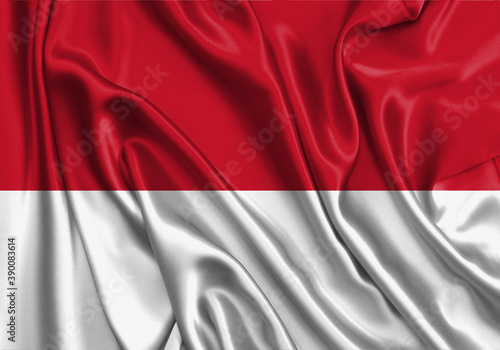 Monaco , national flag on fabric texture. International relationship.