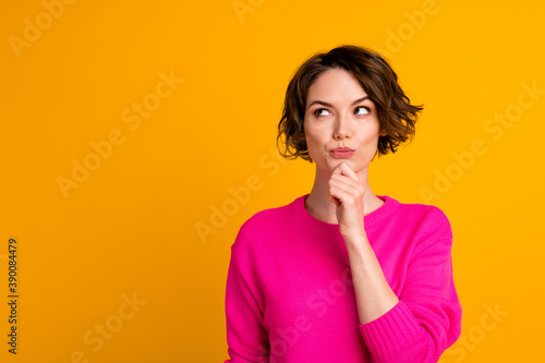 Portrait of minded girl touch fingers chin look copyspace think wear pullover isolated over shine color background