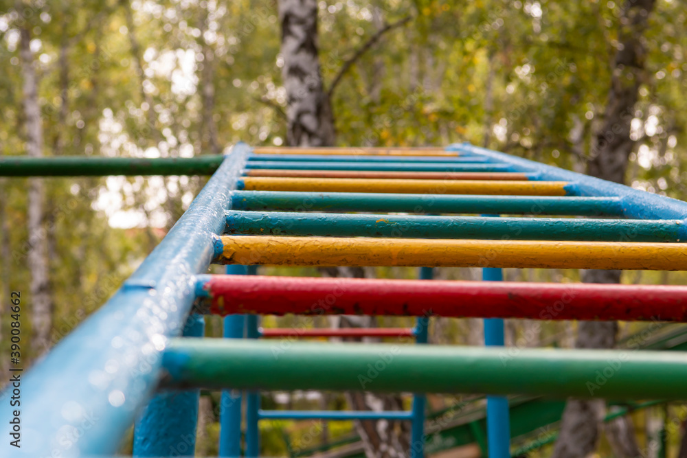 Part of one painted metal staircase in the park