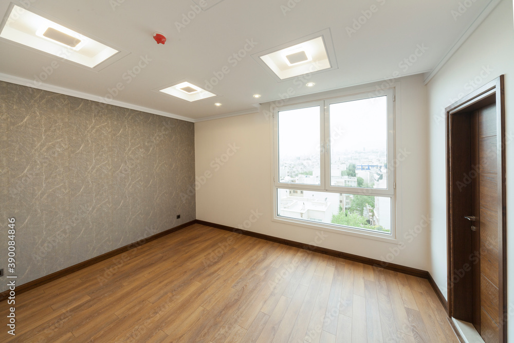Empty room with window, parquet and wallpaper Empty room with window, parquet and wallpaper