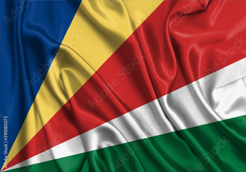 Seychelles , national flag on fabric texture. International relationship.