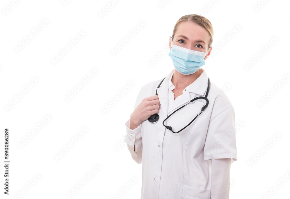 Young doctor in white uniform and stethoscope wearing mask on isolated background Young doctor in white uniform and stethoscope wearing mask on isolated background