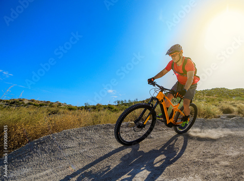 cyclist skating with electric bike