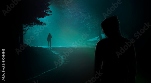 Konstfotografi A person walk into the misty foggy road in a dramatic mystic scene with man in the shadow