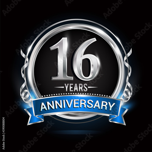 Logo celebrating 16th years anniversary with silver ring and blue ribbon.