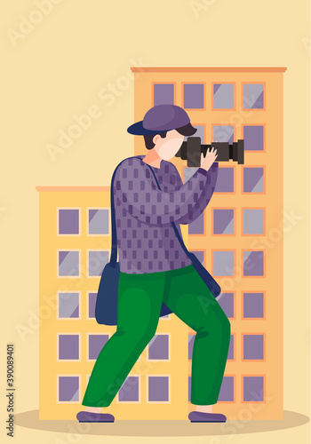 The guy standing and adjusting the lens. Photographic art. A cameraman prepares camera for a photo shoot. Photographer with camera takes picture of the city architecture with scyscraper on background