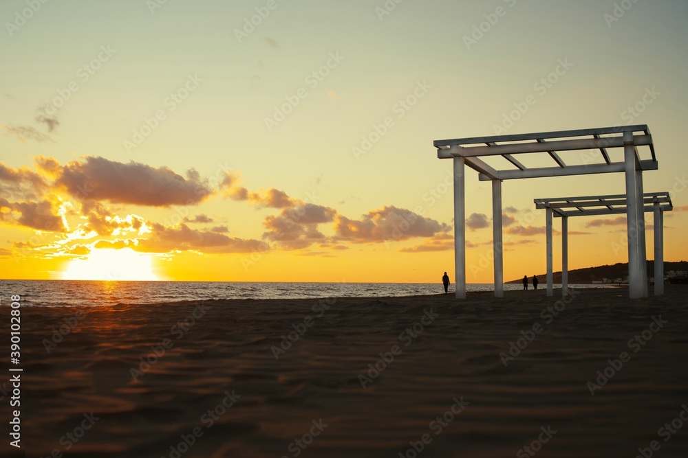 Constructions on the beach. Black sands of the beach in Montenegro. Constructions on the beach. Black sands of the beach in Montenegro.