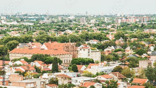 beautiful aerial view of the city with apartment buildings and houses on a hot summer day 