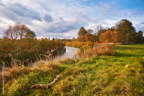 Obraz na płótnie Colorful autumn landscape with forest, field, lake. Scenic rural landscape w salonie