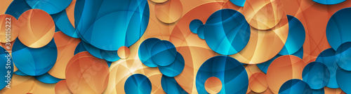 Vibrant glossy blue and orange circles abstract geometric background. Vector banner design