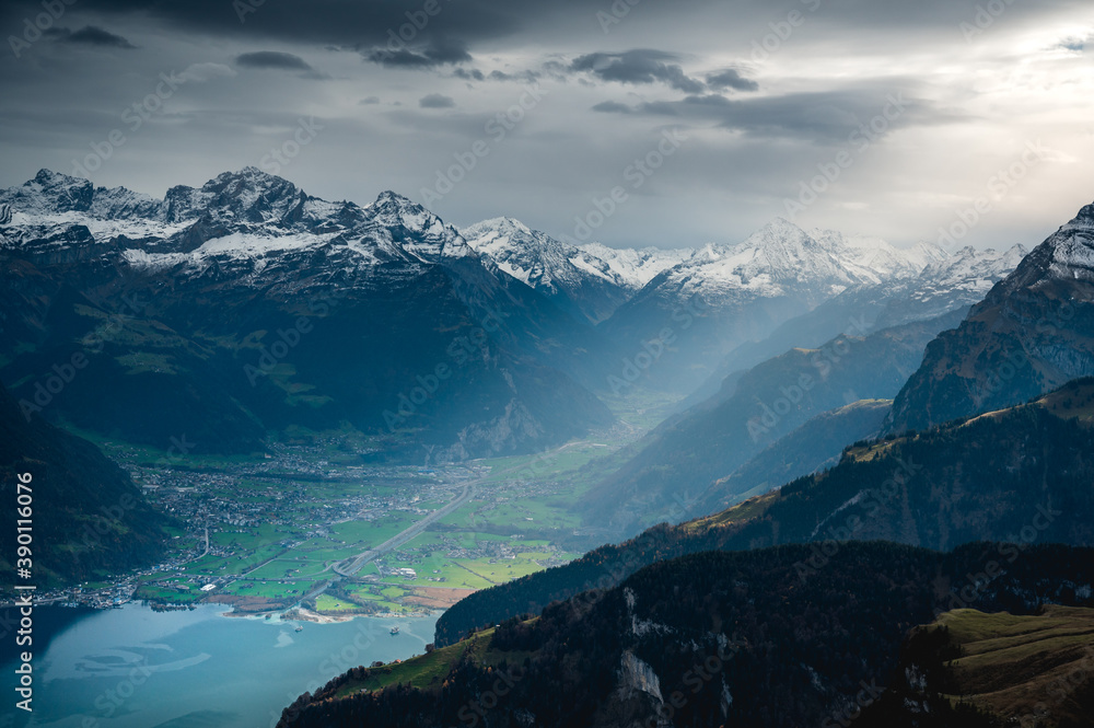 dramatic light on Urnersee with Flüeli and Altdorf with Bristen and