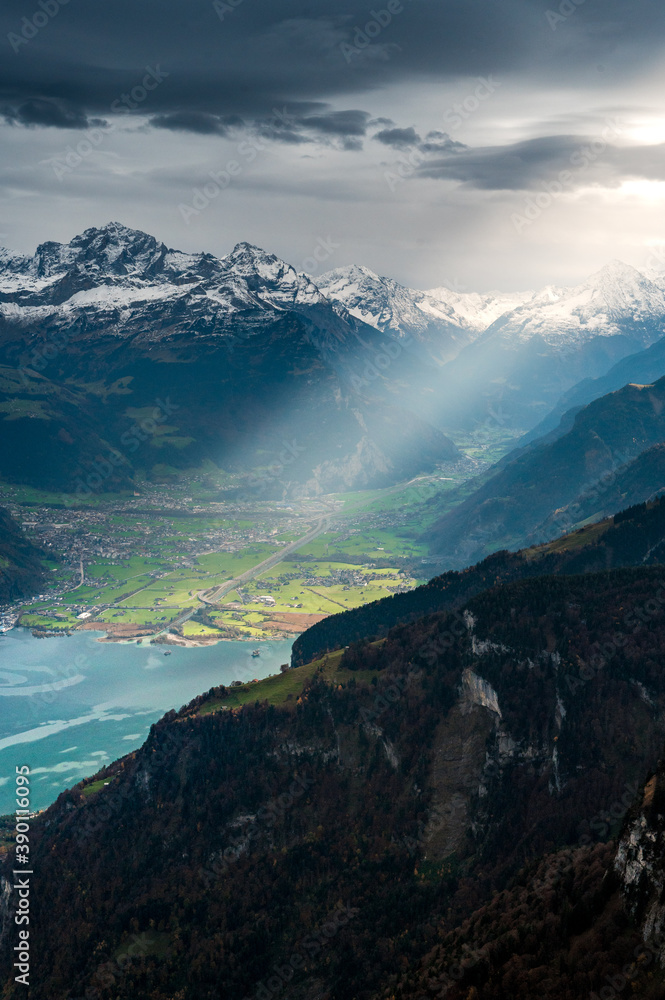 dramatic light into Reussebene with Altdorf and Urnersee