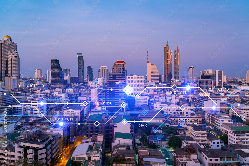 Obraz premium Glowing hologram of technological process, aerial panoramic cityscape of Bangkok at sunset. The largest innovative hub of tech services in Asia. Multi exposure.